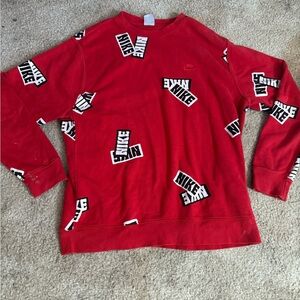 Nike Men's Red Crewneck Sweater with Logo Pattern
